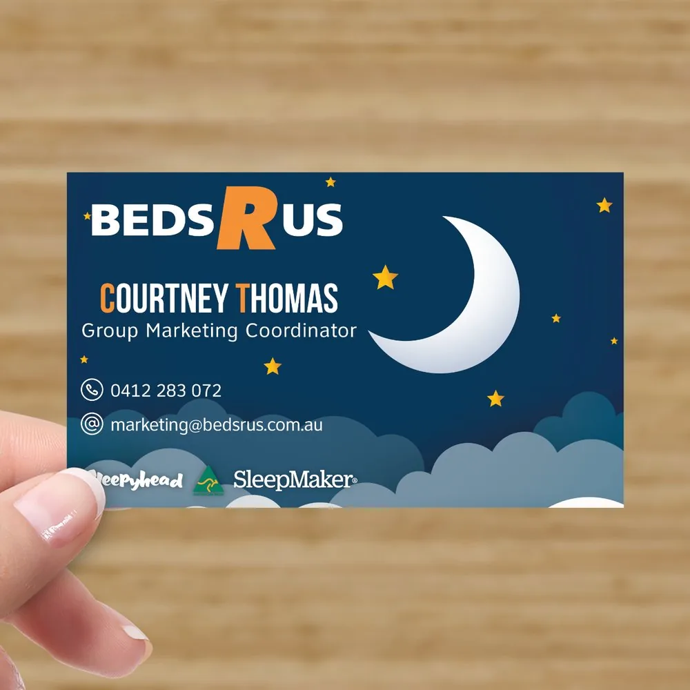 Beds R Us business card design — night-sky theme with moon illustration, staff contact details and mattress brand logos.