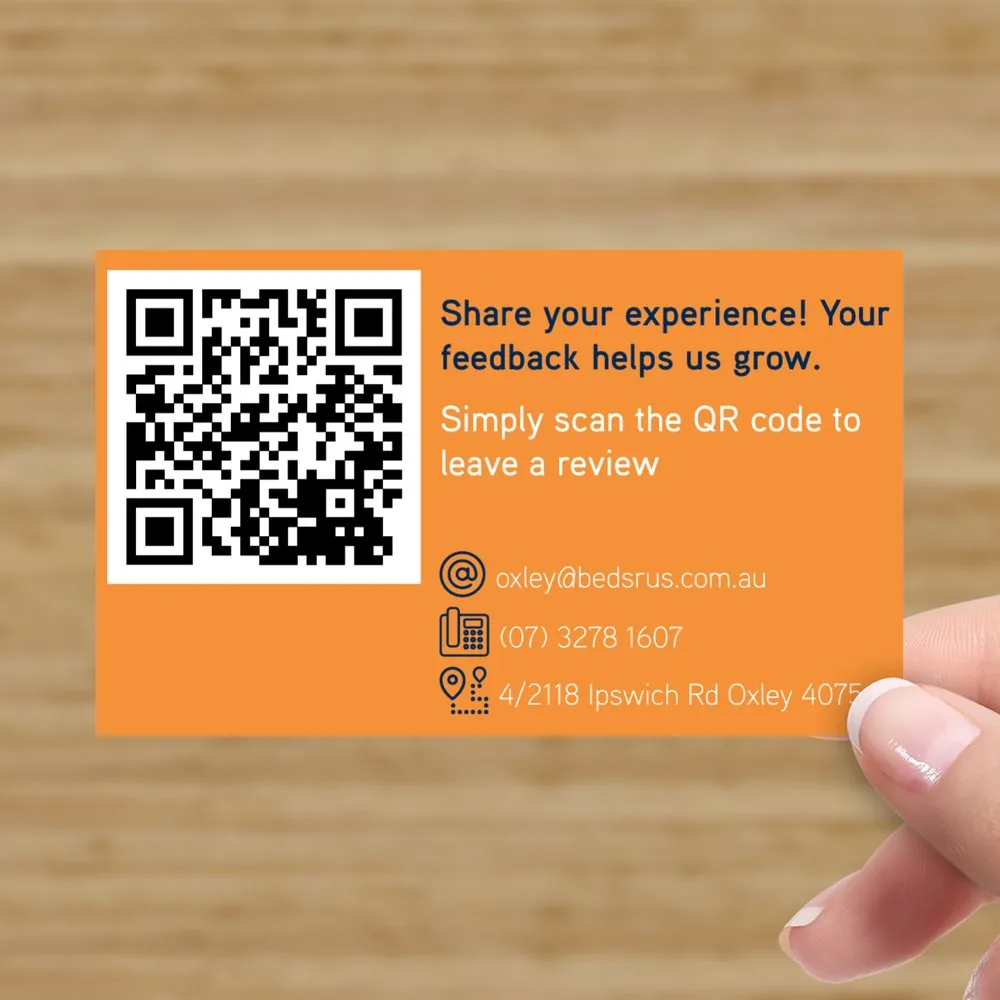 QR code review card design for Beds R Us Oxley with customer feedback message, store contact details and orange brand background.