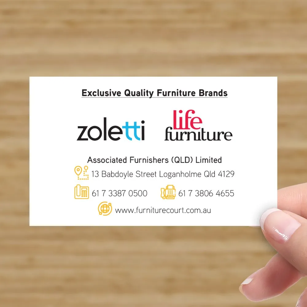 Reverse side of Furniture Court business card featuring associated furniture brand logos, company details and print-ready layout design.