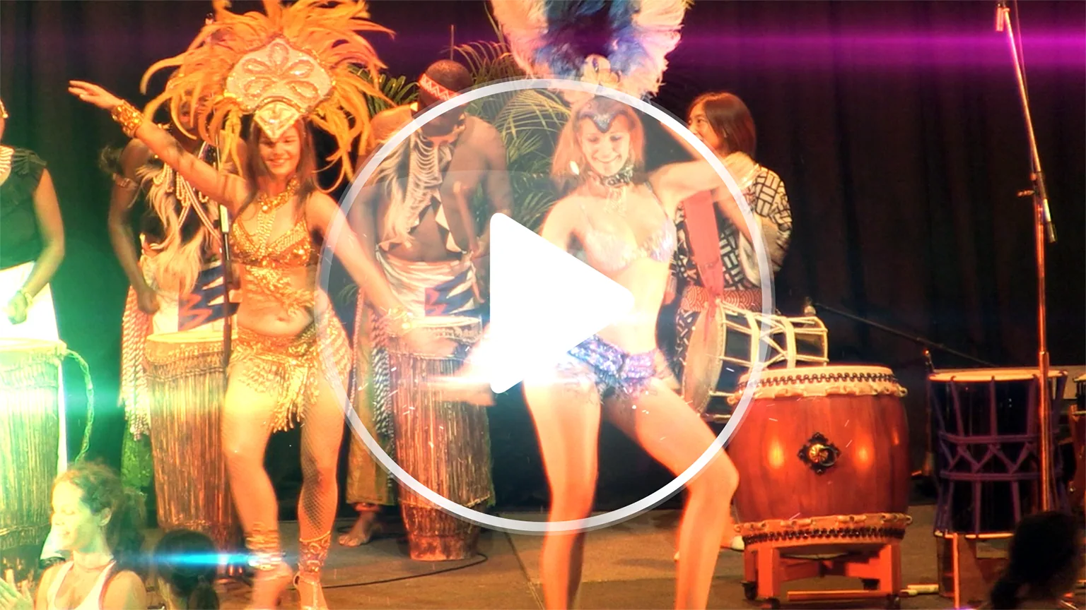 LUMINOUS Lantern Parade cinema commercial still — illuminated parade and multicultural performance.